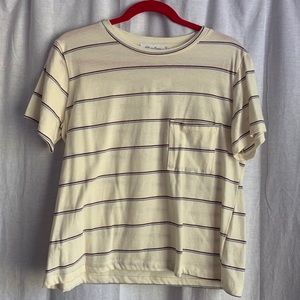 cream top with red and blue stripes
